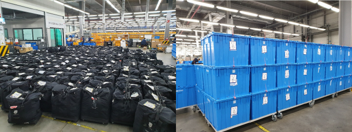 롯데면세점은 상품 운반에 사용되는 행낭을 플라스틱 전용 용기로 변경하기로 했다. [사진 제공 = 롯데면세점]