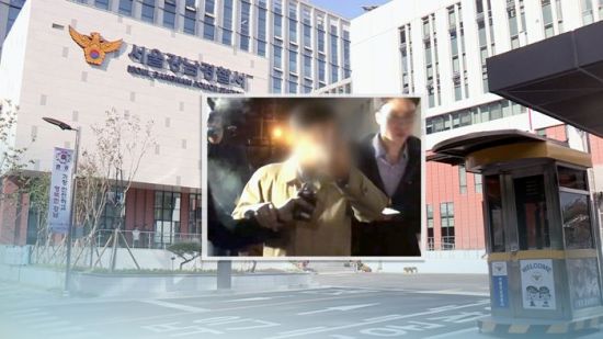 승리 카카오톡 단체 대화방에서 ‘경찰총장’으로 불린 윤 총경(사진 가운데).사진=연합뉴스