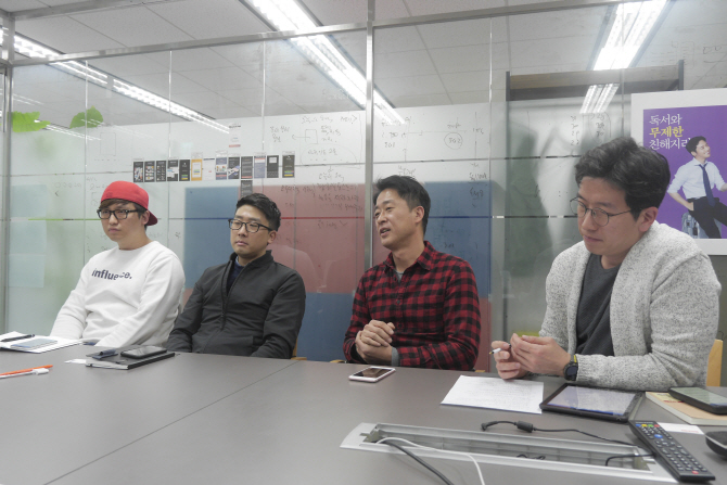 왼쪽부터 남기훈 개발팀 매니저, 김태형 콘텐츠사업팀장, 서영택 대표, 이창훈 브랜드커뮤니케이션팀장. 밀리의 서재 제공