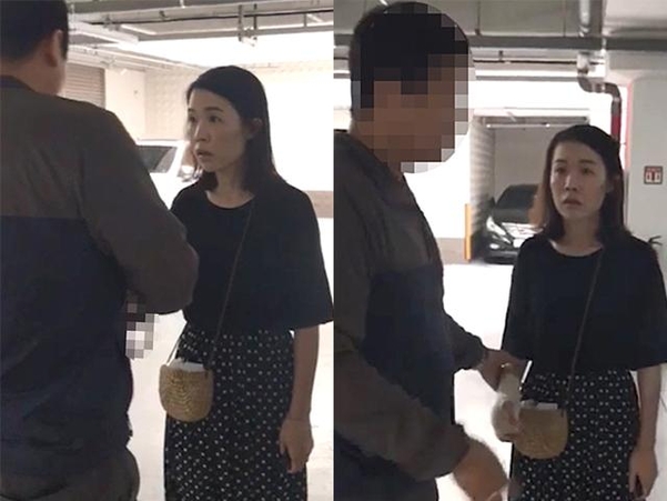 지난달 1일 충북 청주시의 한 아파트 지하주차장에서 제주동부경찰서 형사들이 "긴급 체포하겠다"고 밝히자, 고유정이 "왜요?"라고 말하고 있다. 이 사진은 경찰이 촬영한 영상의 캡처본. /연합뉴스