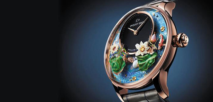 자케 드로가 선보인 '매직 로터스 오토마통'. 버튼을 누르면 시계 자판을 장식한 잉어, 연잎 등이 시계 방향으로 회전한다. 사계절의 변화와 인생의 순환을 은유했다. /자케 드로