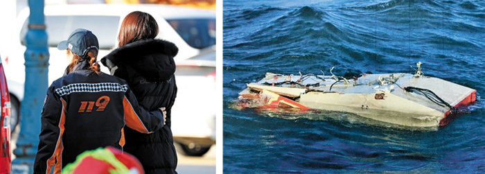 (사진 왼쪽)사고 해역으로 가는 실종자 가족 - 1일 오후 경북 울릉군 사동항에서 전날 추락한 소방 헬기 탑승자의 가족(오른쪽)이 사고 해역으로 가기 위해 119대원의 안내를 받으며 이동하고 있다. (사진 오른쪽)추락한 소방헬기 잔해 - 1일 경북 독도 인근 해역에서 전날 응급환자를 실어 나르다 추락한 소방헬기의 잔해가 물 위에 떠 있다. 사고 헬기 동체는 이날 수심 72m 지점에서 발견됐다. /연합뉴스·해경