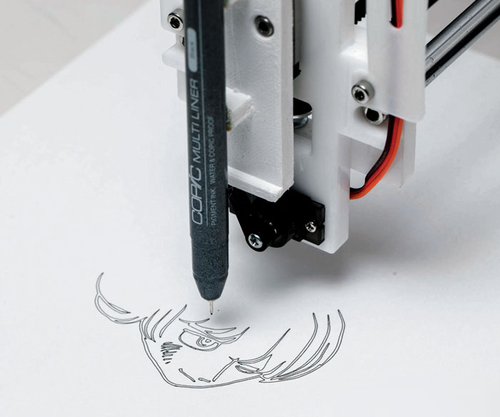 만화 주인공을 그리고 있는 로봇팔. /데즈카 2020 프로젝트