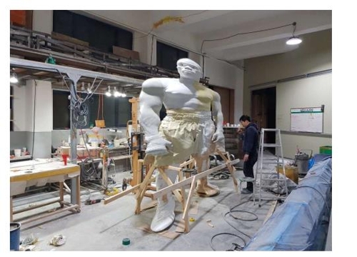 채색을 앞둔 길태산 조각상[IOM 한국대표부 제공]