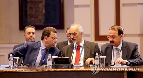 바샤르 알자파리 유엔 주재 시리아대사(가운데) 등 시리아 정부 대표단     [EPA=연합뉴스]