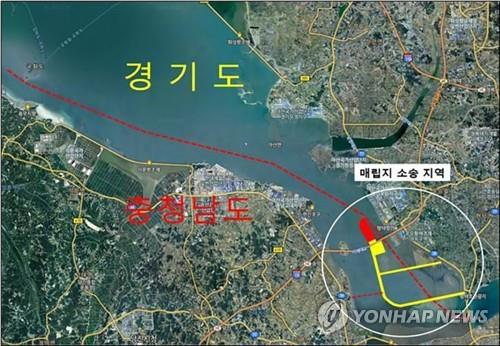 당진·평택항 매립지 소송지역(당진=연합뉴스) 양승조 충남지사와 충남 15개 시장·군수는 27일 당진시청 해나루홀에서 열린 '충남 지방정부회의'에서 당진·평택항 매립지 충남 귀속 결정을 촉구하는 공동건의문을 채택했다. 사진은  당진·평택항 매립지 소송지역. 2019.5.27 [당진시 제공]