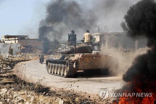 시리아 하마州 외곽 이동하는 친(親)터키 시리아 반군 NLF 부대    [AFP=연합뉴스]