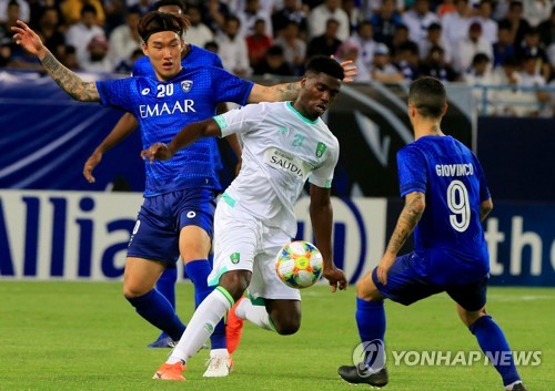 알 아흘리와의 경기에 출전한 장현수(20번)[AFP=연합뉴스]