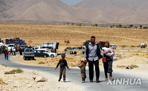 시리아 난민 가족 [신화=연합뉴스]