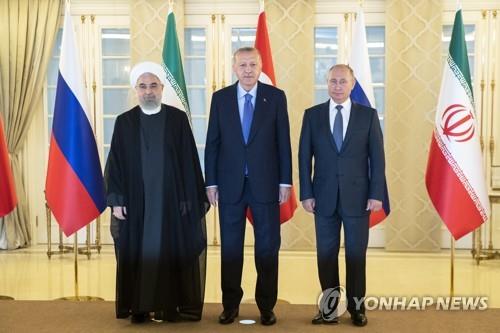 터키 수도 앙카라에서 만난 이란(좌)·터키·러시아(우) 대통령 [EPA=연합뉴스]