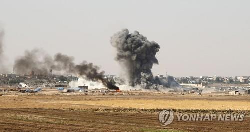 터키군의 공격을 받은 시리아 국경도시 라스 알-아인 [AFP=연합뉴스]