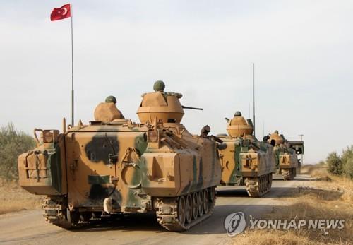 시리아 만비즈로 이동 중인 터키군 [AFP=연합뉴스]