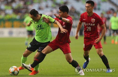 지난 시즌 전북과 상하이 상강의 경기 장면[연합뉴스 자료사진]