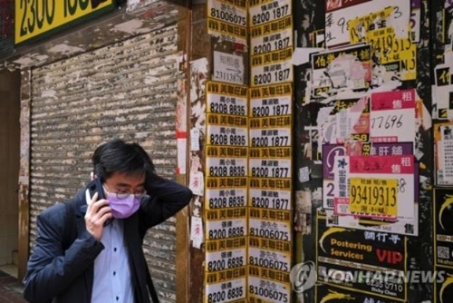 불황으로 문을 닫은 홍콩의 점포(홍콩 로이터=연합뉴스)