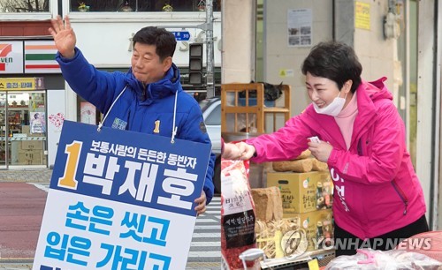 박재호 이언주 후보 등록 첫 주말 대결(부산=연합뉴스) 제21대 총선 후보 등록 이후 첫 주말인 28일 부산 남구을 선거구에 출마한 더불어민주당 박재호 후보(왼쪽)와 미래통합당 이언주 후보가 유권자에게 지지를 호소하고 있다. 2020.3.28 [후보 제공.재판매 및 DB 금지] ccho@yna.co.kr