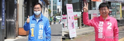 지지 호소하는 서귀포시 위성곤(왼쪽)·강경필 후보[연합뉴스 자료 사진]