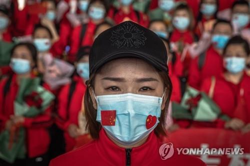 우한서 철수하는 중국 지린대 의료진 [EPA=연합뉴스]