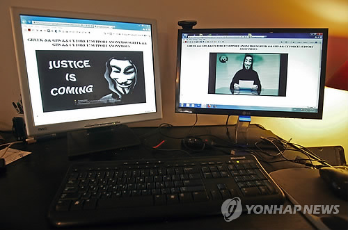 어나니머스의 경고[EPA=연합뉴스 자료사진]