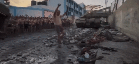 하마스 대원이 무기를 내려놓은 채 돌아가고 있다./엑스